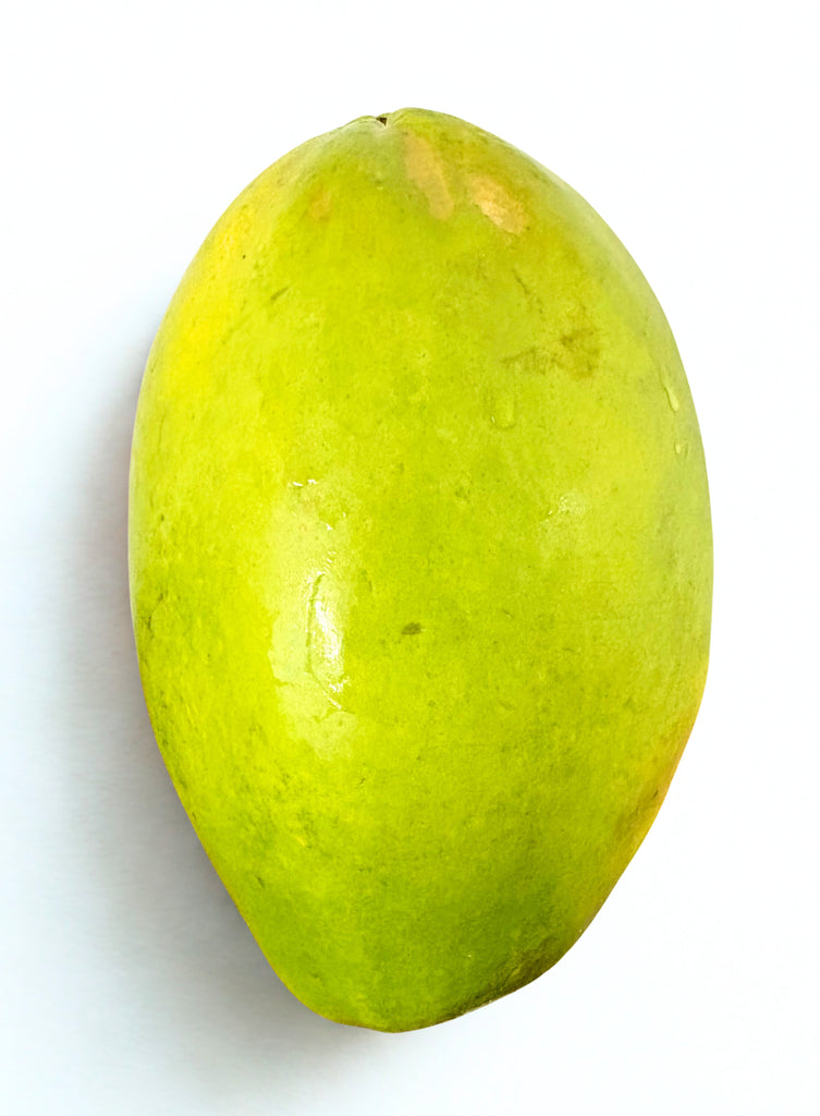 Green papaya on a white background